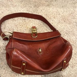 Vintage Dooney  & Bourke bag. Genuine Florentine Vacchetta leather.